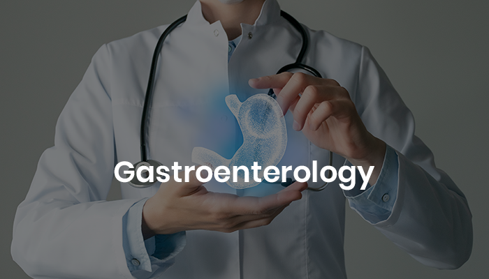 A healthcare professional in a white coat holds a glowing, 3D representation of a stomach, symbolizing the field of gastroenterology.