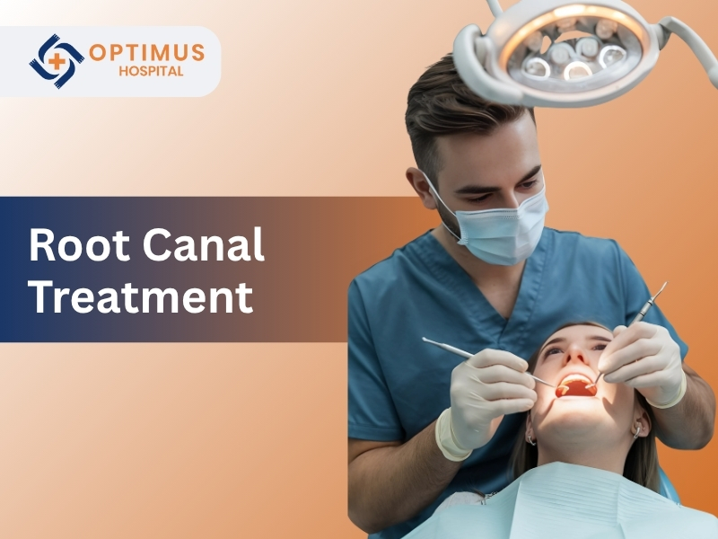 Dentist performing painless root canal treatment on a patient at Optimus Super Specialty Hospital in Gurgaon, Harya